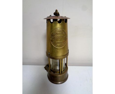 A brass Eccles protector miner's lamp 