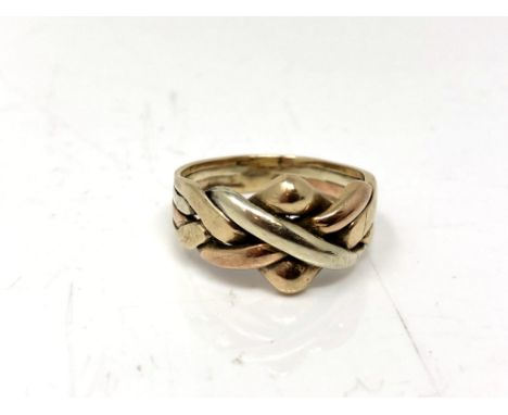 A 9ct gold knot ring, size Q.  CONDITION REPORT: 5.4g. 