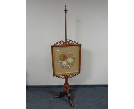 A Victorian mahogany tapestry pole screen  