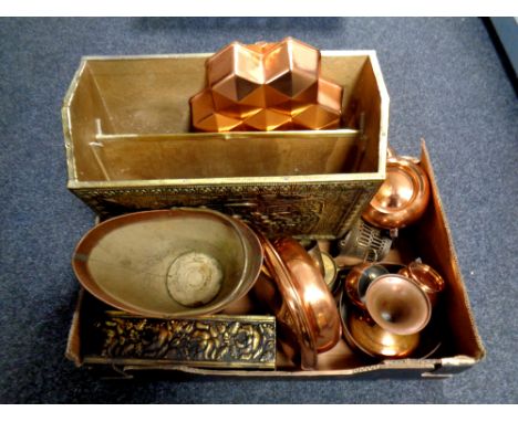 A box containing metal wares to include brass embossed magazine rack, copper planter, jelly mould, copper tea ware etc  