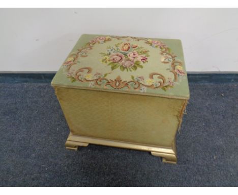A pine tapestry upholstered storage footstool  