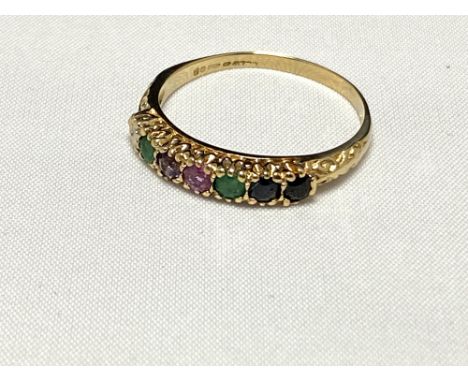 A 9ct gold ring with coloured gemstones, spelling the word 'Dearest', size R, 1.8 grams 