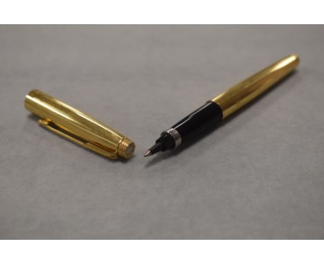 A Parker 75 rollerball pen in gold.
Pen has no engravings or markings having been added