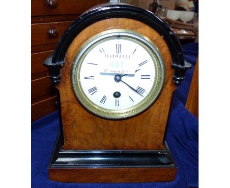 A 19th century walnut mantel clock with ebonised mouldings, white enamel dial and timepiece movement, height 9"