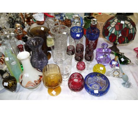 A Tiffany style lamp and a selection of coloured glassware