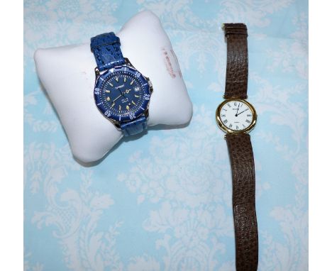 A Tissot quartz sports watch; another watch by Accurist