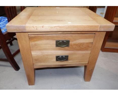 A nest of 3 light oak occasional tables; a similar side table