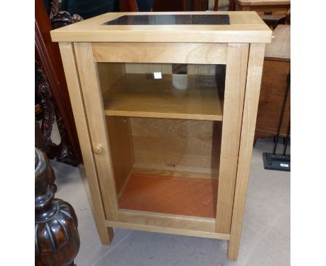 A light oak coffee table with storage drawers under; a similar glazed dwarf cabinet