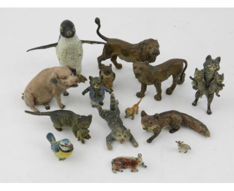 A collection of Austrian cold painted bronze animal studies, to include a penguin, lions, cats, a pig and others. (some stamp