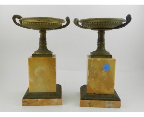 A pair of 19th century bronze and Sienna marble tatsa, having leaf carrying handles, raised on column and plinth. H.25cm