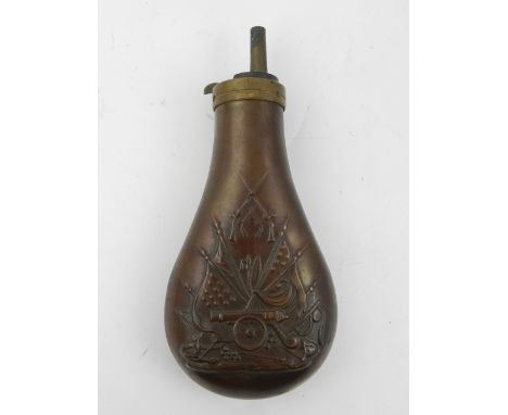 A late 19th / early 20th century embossed copper shot flask H.18cm