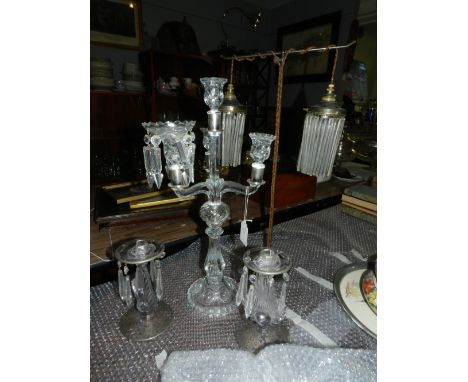A pair of Venetian table lustres, their drip pans with hanging glass drops, the stem modelled as a stylised leaf leading to a