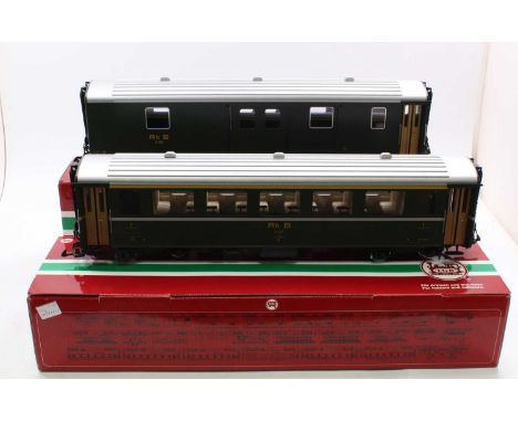 2 x LGB G scale 45mm bogie coaches, comprising 31675, an all-first green coach finished in Rh B livery, and 33690, a general 