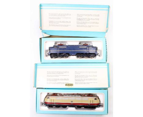 A Marklin HO scale diesel and electric boxed locomotive group to include a No. 3053DB E 03002 diesel electric locomotive, fin