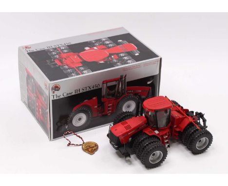 An ERTL No 14102 1/32 scale model of a Case IHSEX 450 tractor housed in the original series 2 precision style packaging