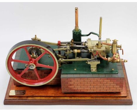 A well-engineered model of a Stationary Horizontal Live Steam Mill Engine, comprising of large single cylinder with slip ecce