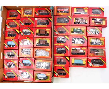 Approx. Forty Triang/Triang Hornby 4-wheeled goods wagons, a wide variety, a few duplicates. Some appear to be (M) Overall (E
