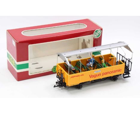 LGB 3025 panoramic yellow coach, with metal roof supports. Model features underframe detail, passengers, a detailed interior,