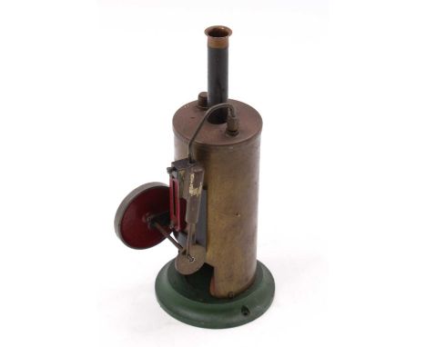 A Burmac Products circa 1947 vertical spirit fired steam engine on heavy weighted base, of usual specification, free running 