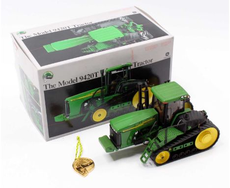 An ERTL No. 15286 1/32 scale diecast model of a John Deere model 9420T tractor housed in the original precision series 2 pack