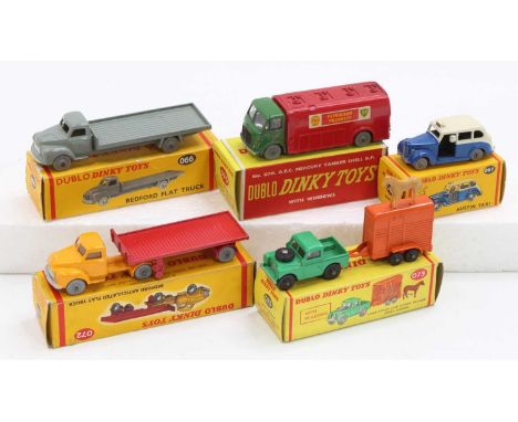 Five Dubo Dinky Toys: 066 Bedford Flat Truck, grey, SGW (E) (BVG) darker yellow; 067 Austin Taxi, blue &amp; cream, GTW, (E) 