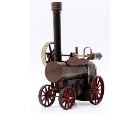 A Doll et Cie portable live steam  engine, comprising of horizontal boiler with original burner, and DC trademark to rear, co