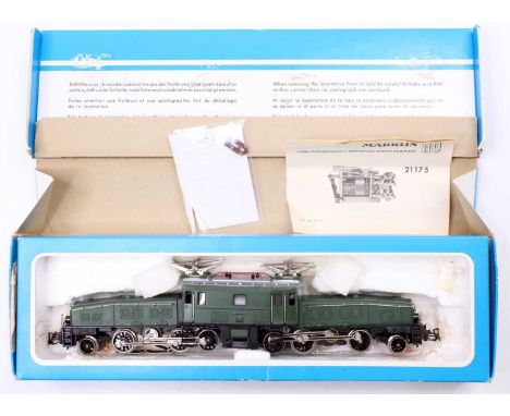 A Marklin No. 3015 HO scale crocodile electric locomotive, 3-rail example, finished in green with good clean pantographs, hou
