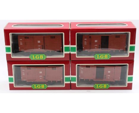 4x LGB G scale 45mm 4030 4-wheeled wagons finished in DR brown. Models feature detailed chassis, with rivet detail, sliding d