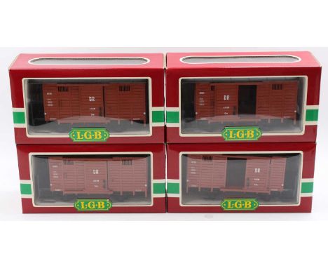 4x LGB G scale 45mm 4030 4-wheeled wagons finished in DR brown. Models feature detailed chassis, with rivet detail, sliding d