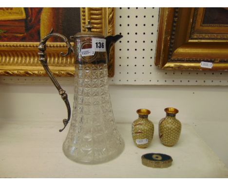 A trinket box, two miniature Cloisonne vases and a silver plated cut glass claret jug