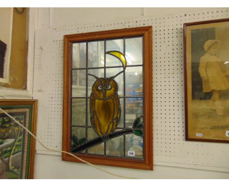 A lead light framed owl picture