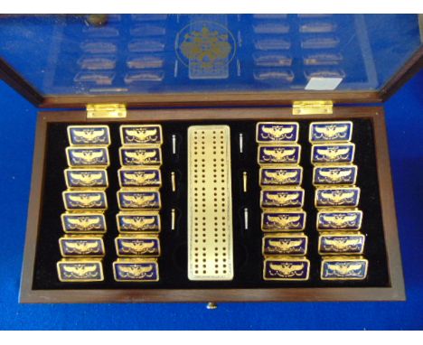 A House of  Faberge Imperial boxed Gold plated 22k and dark blue enamel gulloiche inlay, Silver Ingot Domino set, decorated w