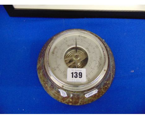 A wall barometer/ thermometer