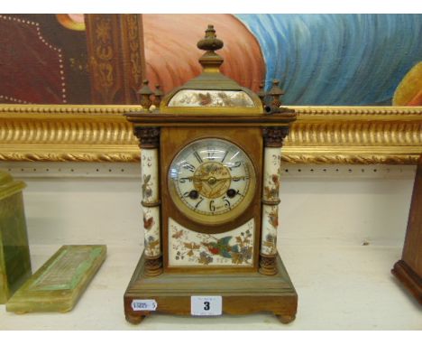 A ceramic and brass French mantle clock, a.f