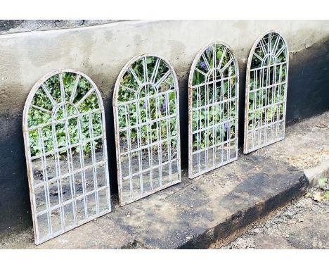 ARCHITECTURAL GARDEN MIRRORS, a set of four, 60cm H x 36cm W, Regency style, with overlaid glazing bars, aged metal frames. (