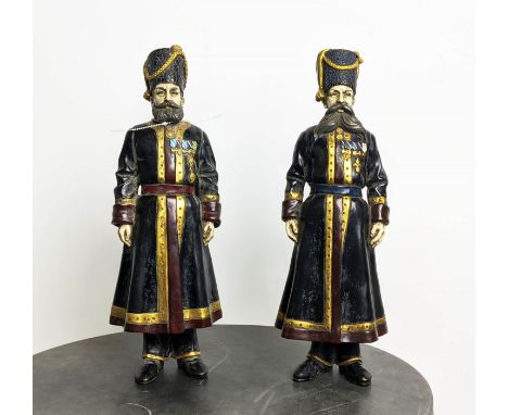 AFTER FABERGÉ RUSSIAN COSSACKS, a set of two, cast metal, 41cm H each. (2) 