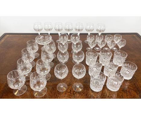 STUART 'MANHATTAN' CUT CRYSTAL GLASSES, comprising eight whiskey, eight sherry, eight white wine, seven red, eight brandy gla