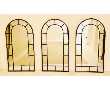 ARCHITECTURAL WALL MIRRORS, 107cm high, 55cm wide, set of three, Regency style, gilt metal frames. (3) 