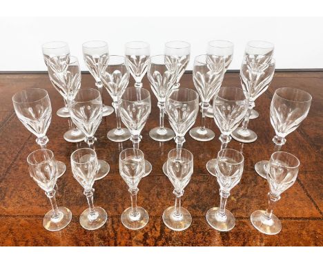 ATLANTIS CUT GLASSES, comprising eleven wine glasses, six white wine glasses and six sherry glasses. (23) 