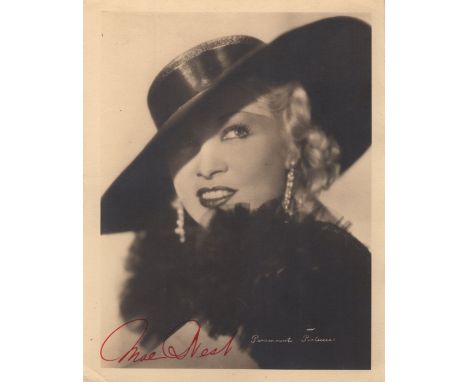 WEST MAE: (1893-1980) American Actress and Sex Symbol. Vintage signed sepia 5½ x 7 photograph, the image depicting the actres