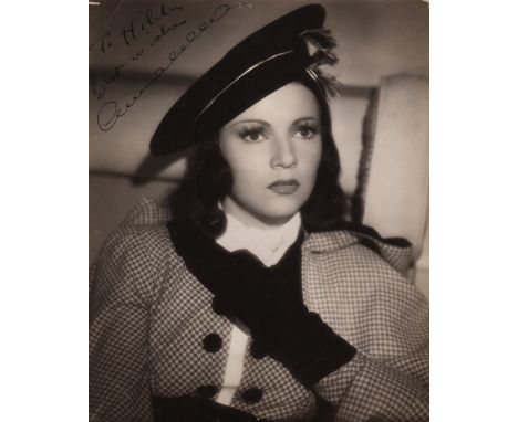 ANNABELLA: (1907-1996) French Actress. Vintage signed and inscribed 7½ x 9½ photograph, the image depicting the actress in a 