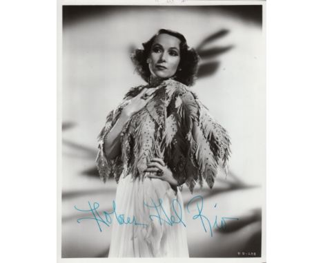  DEL RIO DOLORES: (1905-1983) Mexican Actress. Signed 8 x 10 photograph of Del Rio standing in a three-quarter length pose. S