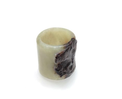 Chinese jade nephrite archers ring, carved with a stylised dragon, height 2.7cm, diameter 2.4cm.  Condition report: No damage