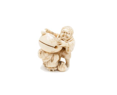 A Japanese ivory netsuke of a devil beating a drum, Meiji period, height 4.5cm. Condition report: No condition issues.