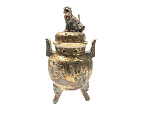 A Japanese Satsuma koro and cover, late 19th century, with jewelled temple dog finial, twin lug handles, the bulbous body pai