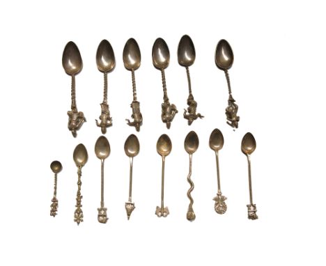 A set of six North Indian silver spoons, each finial modelled as a dancer together with eight other spoons, 280g.