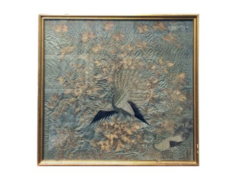 A Chinese silk embroidered panel, late 19th century, with gold metal thread birds and flowering trees, framed and glazed, 49.