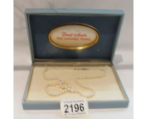 A cultured pearl necklace with 14ct white gold clasp.