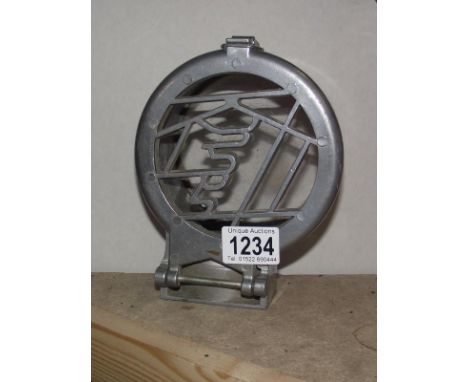 An aluminium Kirby light fitting