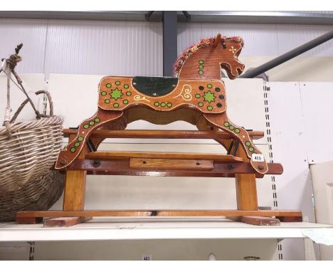 A child's wooden rocking horse